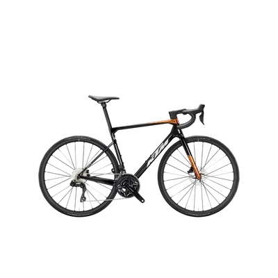 KTM Revelator Alto Elite Di2 2025 férfi Országúti Kerékpár Carb+Burnt Orange (Op. White)